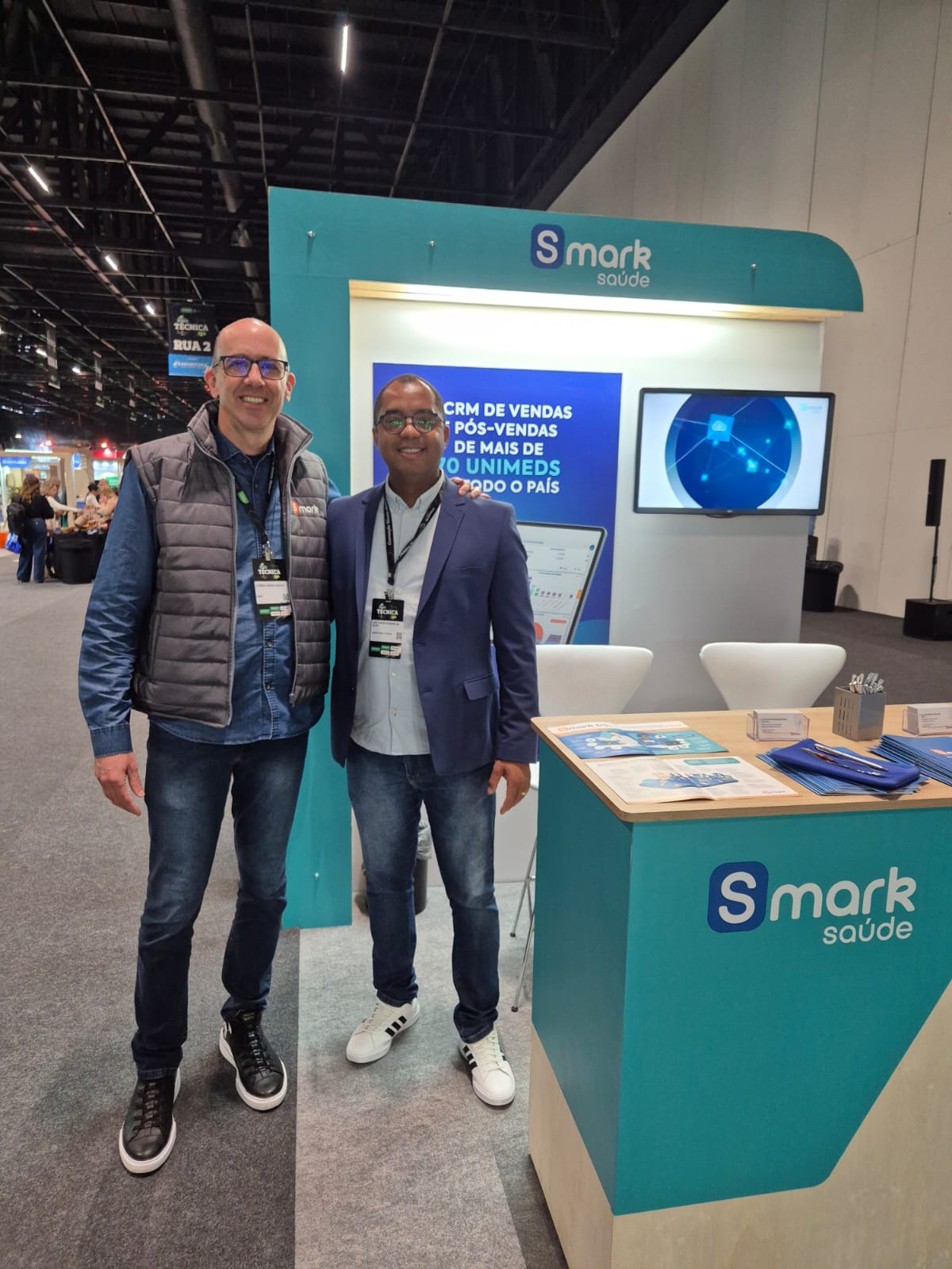 Leandro Ribeiro Ceccato, CEO da Smark, com o parceiro de longa data Luiz Carlos Cardoso, da Unimed Poços de Caldas